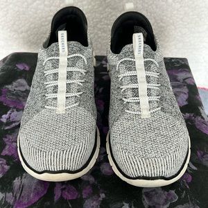 Women’s size 9 Skechers Slip On Sport Sneaker black/white good condition.